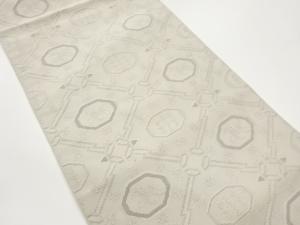 綴れ松皮菱に七宝・抽象動物模様織出し名古屋帯